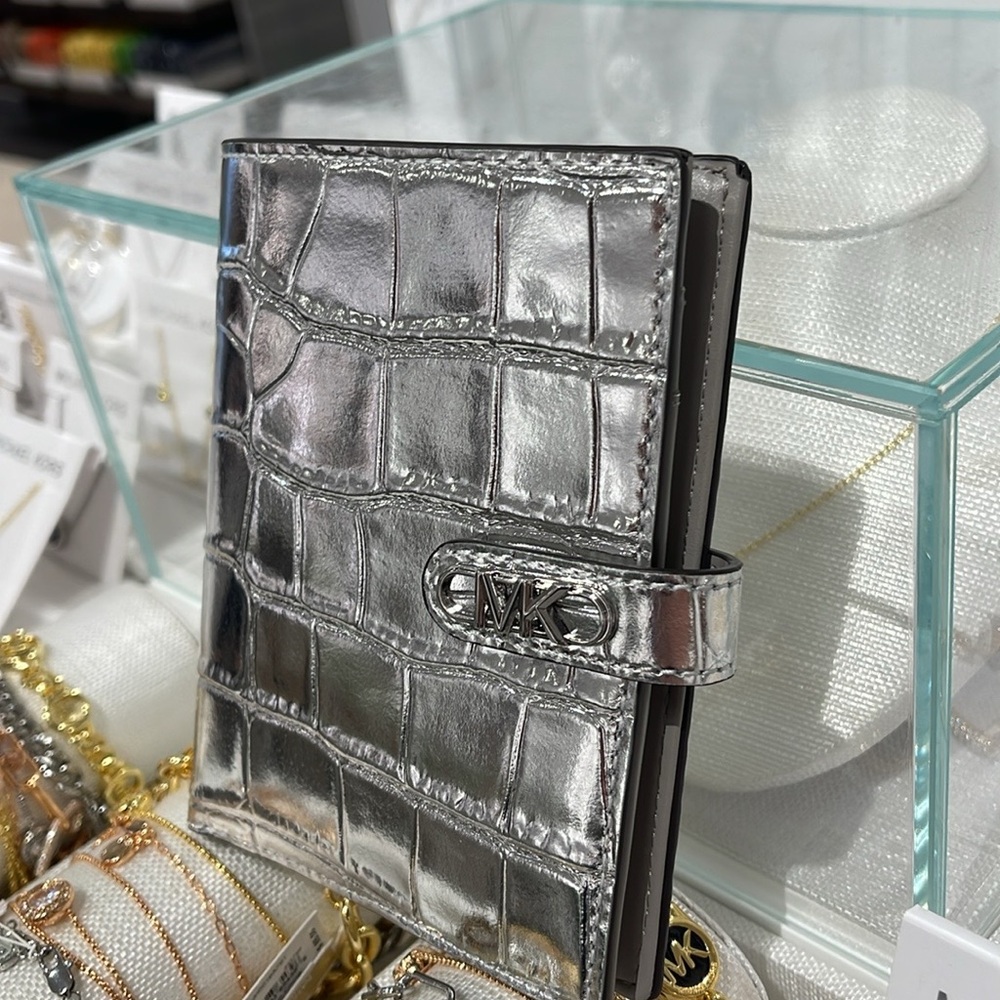 Michael Kors Empire Metallic Crocodile Embossed Leather Passport Wallet
Silver - Picture 13 of 16